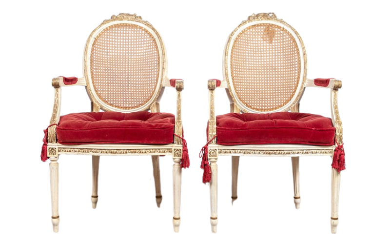 a pair of antique Louis XVI style fauteuils with cane backed and burgundy cushions